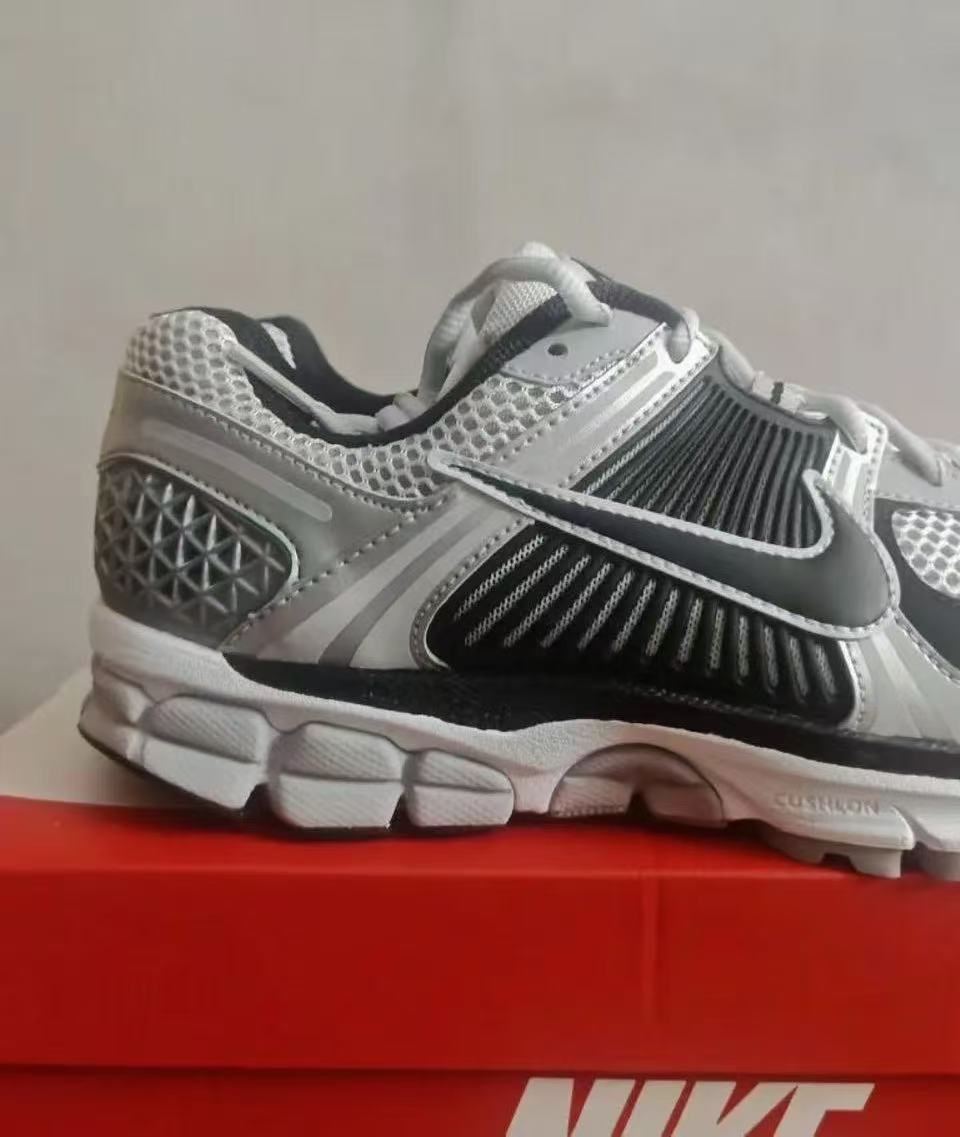 Nike Air Max 96 Sneakers in Silver Gray and Black - product image from the listing.