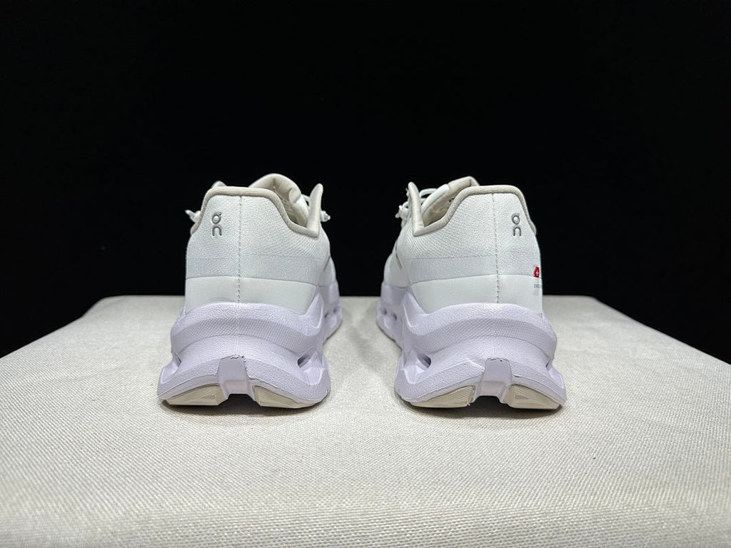 On Cloudtilt Trainers in White and Lavender - product image from the listing.