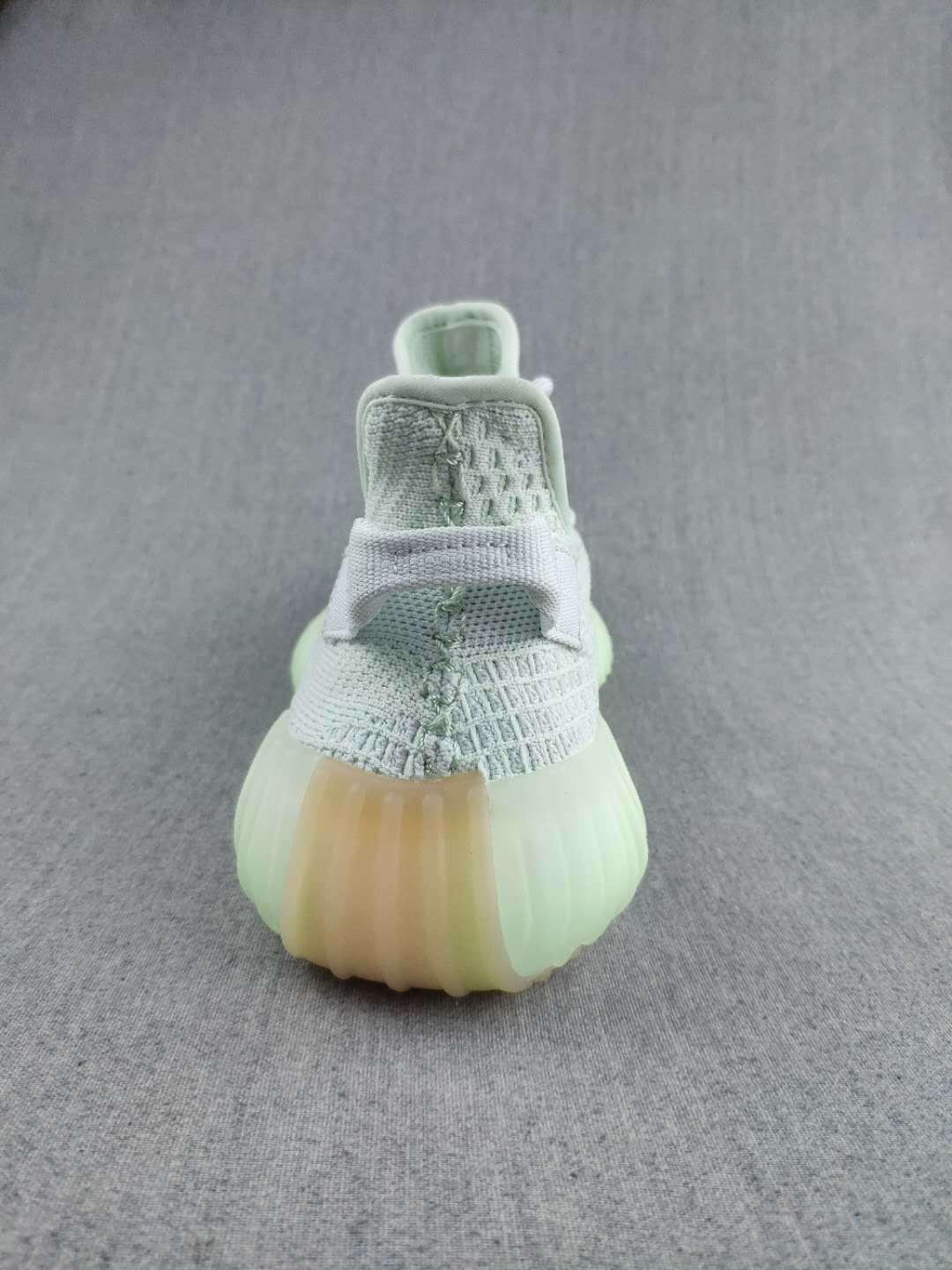 White and Tan Yeezy 350 V2 Knit Sneakers - product image from the listing.