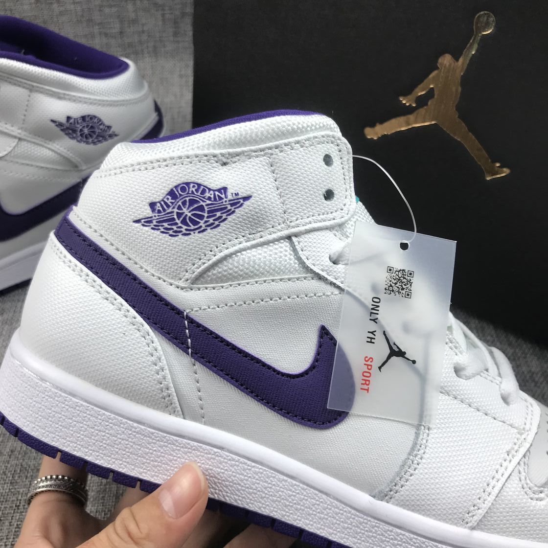 Air Jordan 1 Mid Sneakers in White Purple 332148-137 - product image from the listing.