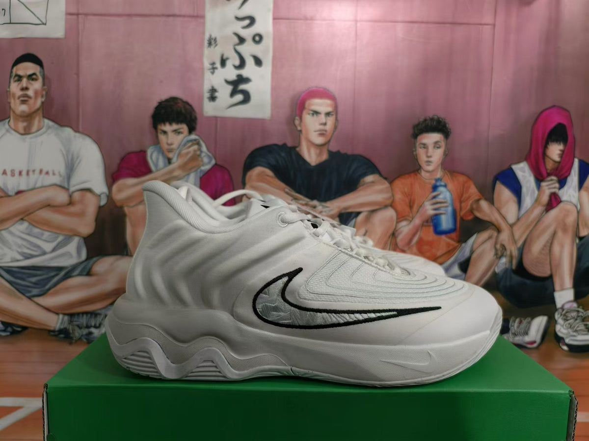 Nike White Basketball Trainers with Black Swoosh - product image from the listing.