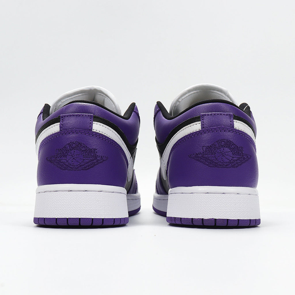 Jordan 1 Low Sneakers in Black Purple White 553560-501 - product image from the listing.