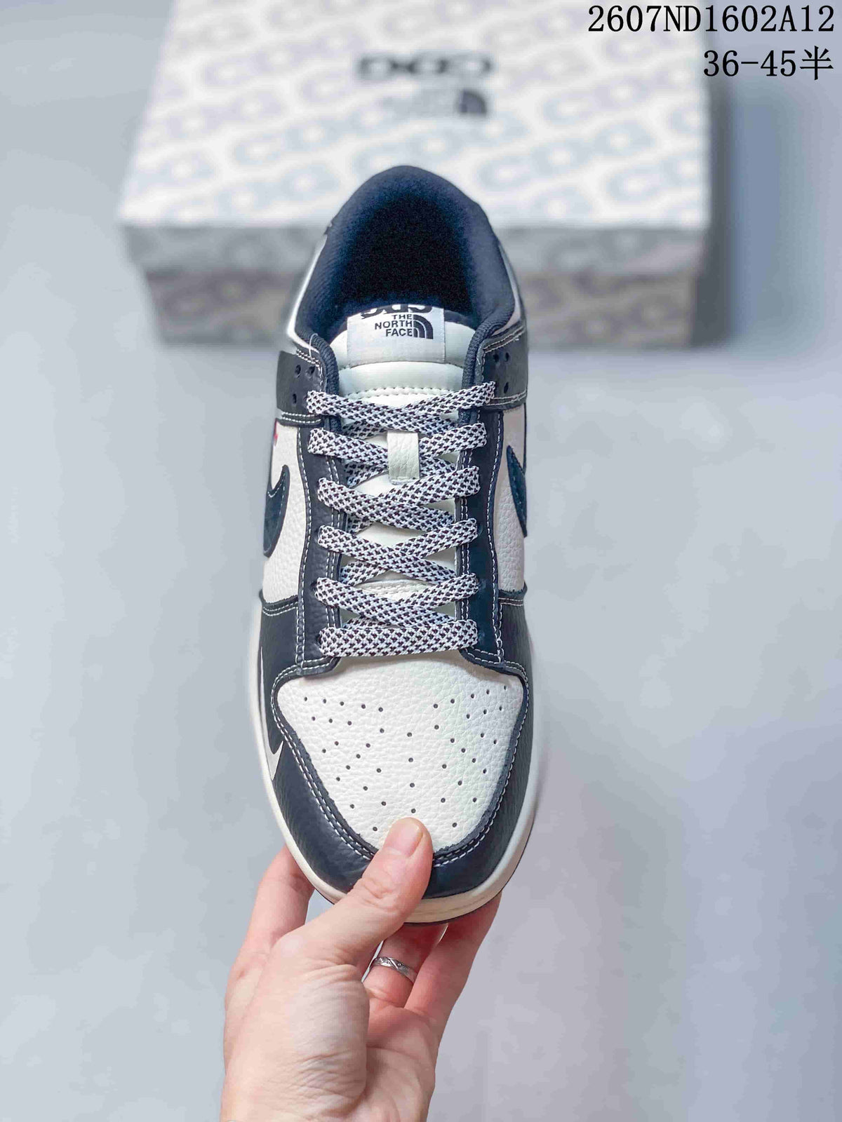 Nike SB Dunk Low North Face Color-Block Trainers - product image from the listing.