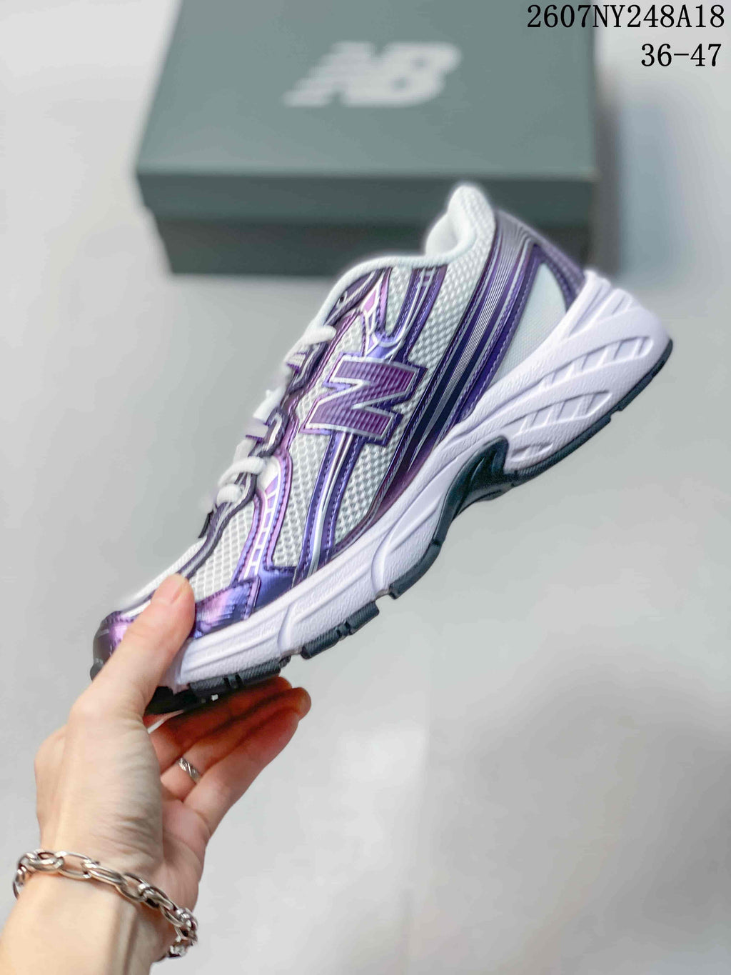 New Balance 740 Sneakers in White and Purple - product image from the listing.