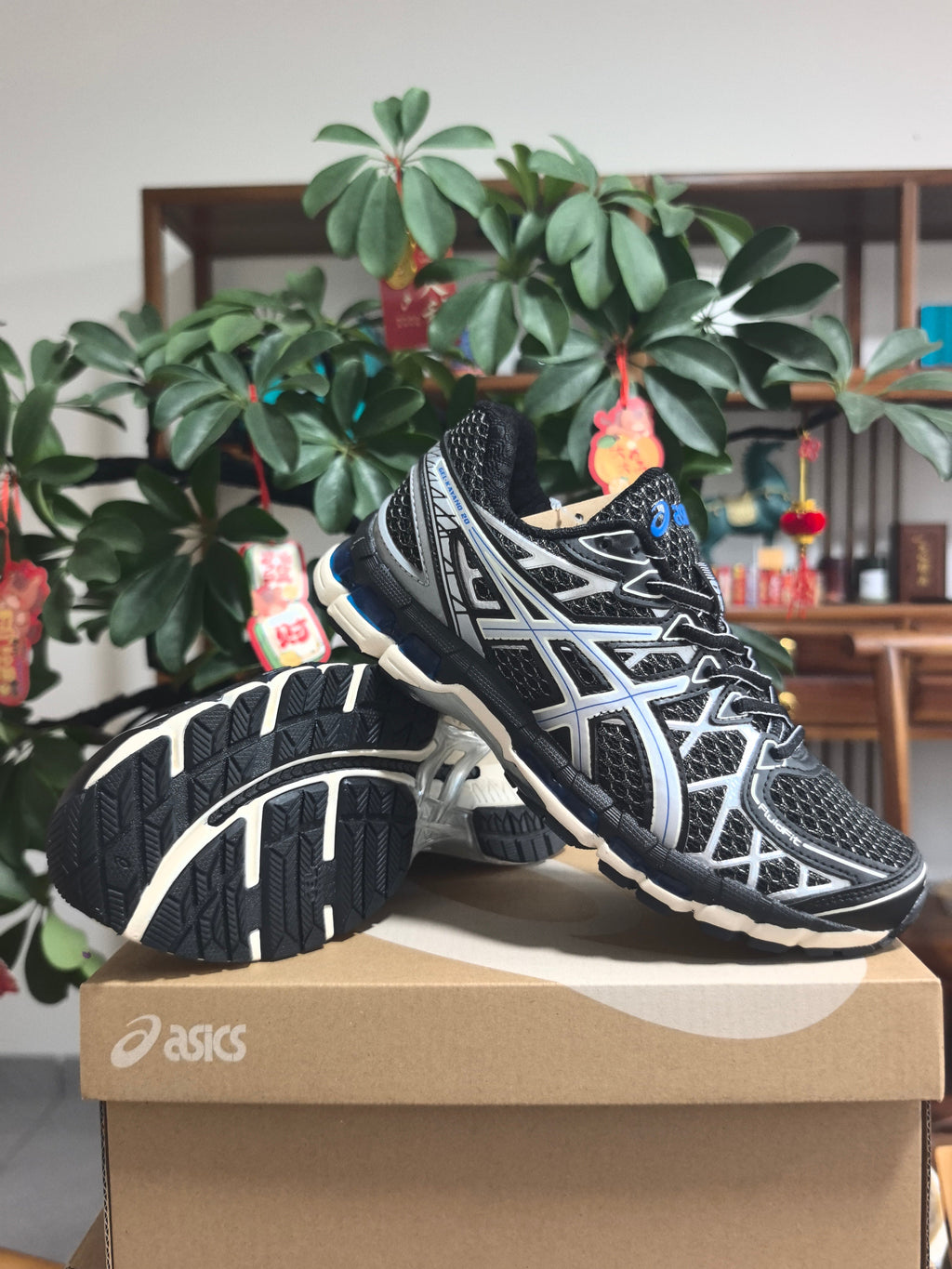 ASICS GEL-KAYANO 20 Sneakers in Black Silver Blue - product image from the listing.