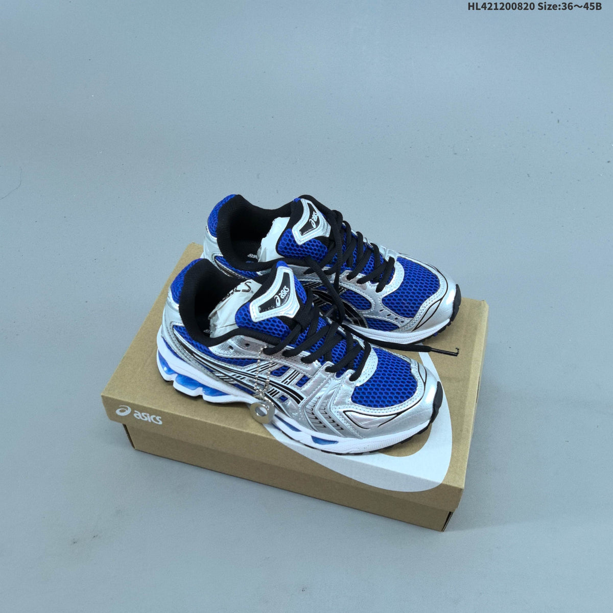 ASICS Gel-Kayano 14 Mesh Sneakers for Running - product image from the listing.