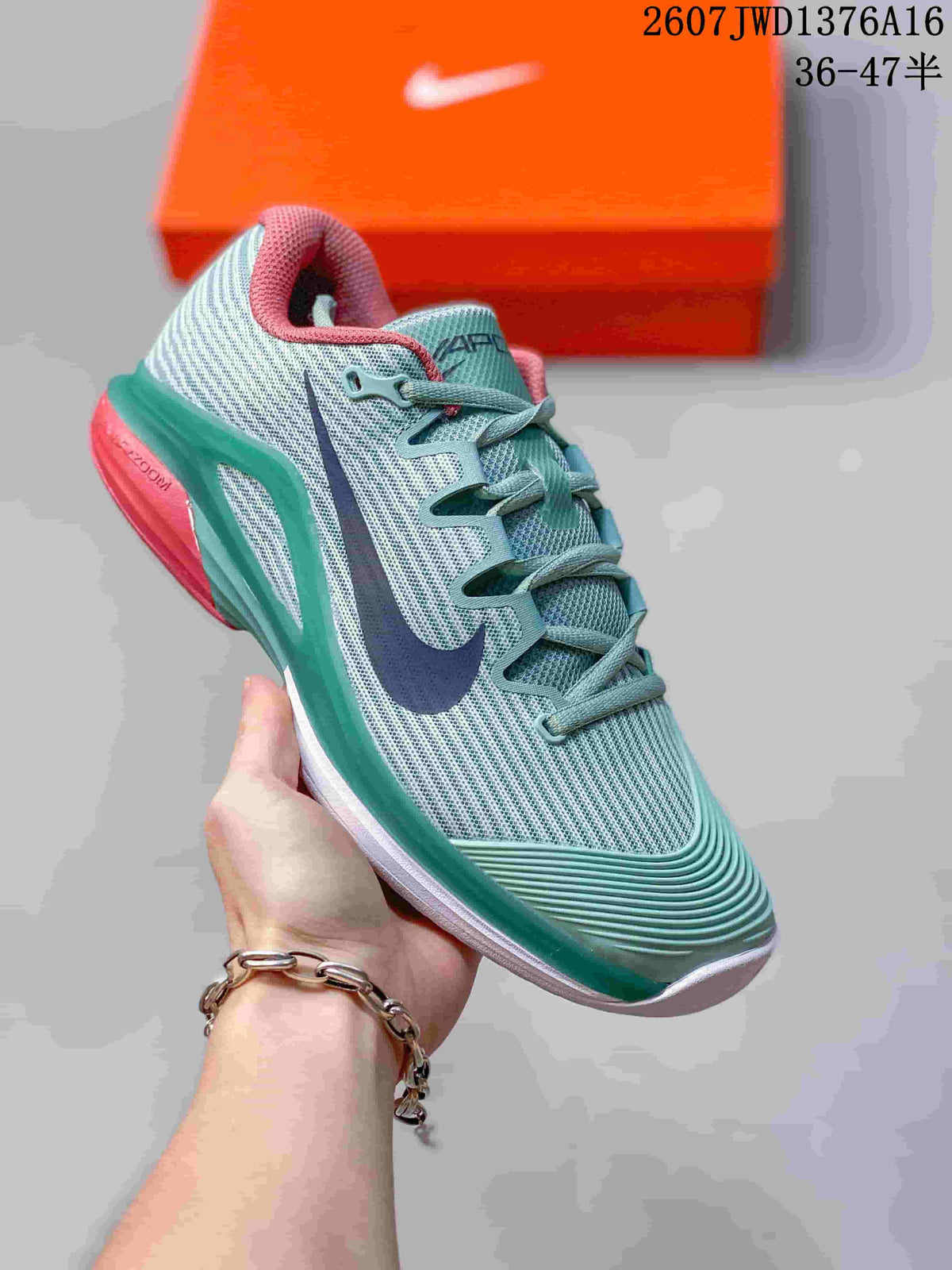 Mint Green and Coral Nike Vapor 12 Low-Top Tennis Sneakers - product image from the listing.