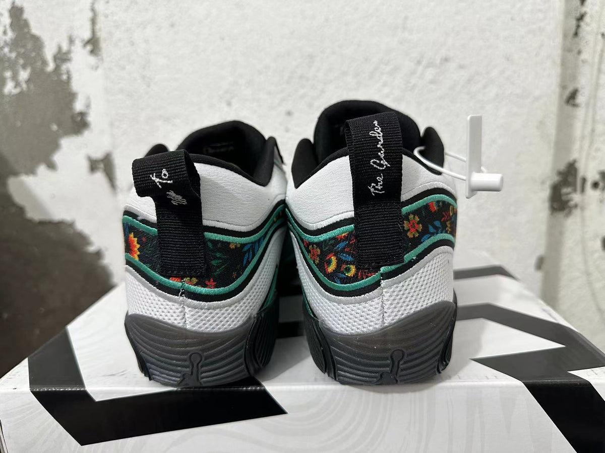 Jordan Luka 1 Basketball Footwear Black White Green Floral - product image from the listing.