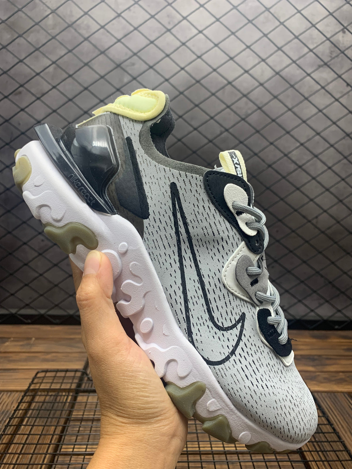 Light Grey and Black Nike React Vision Sneakers - product image from the listing.