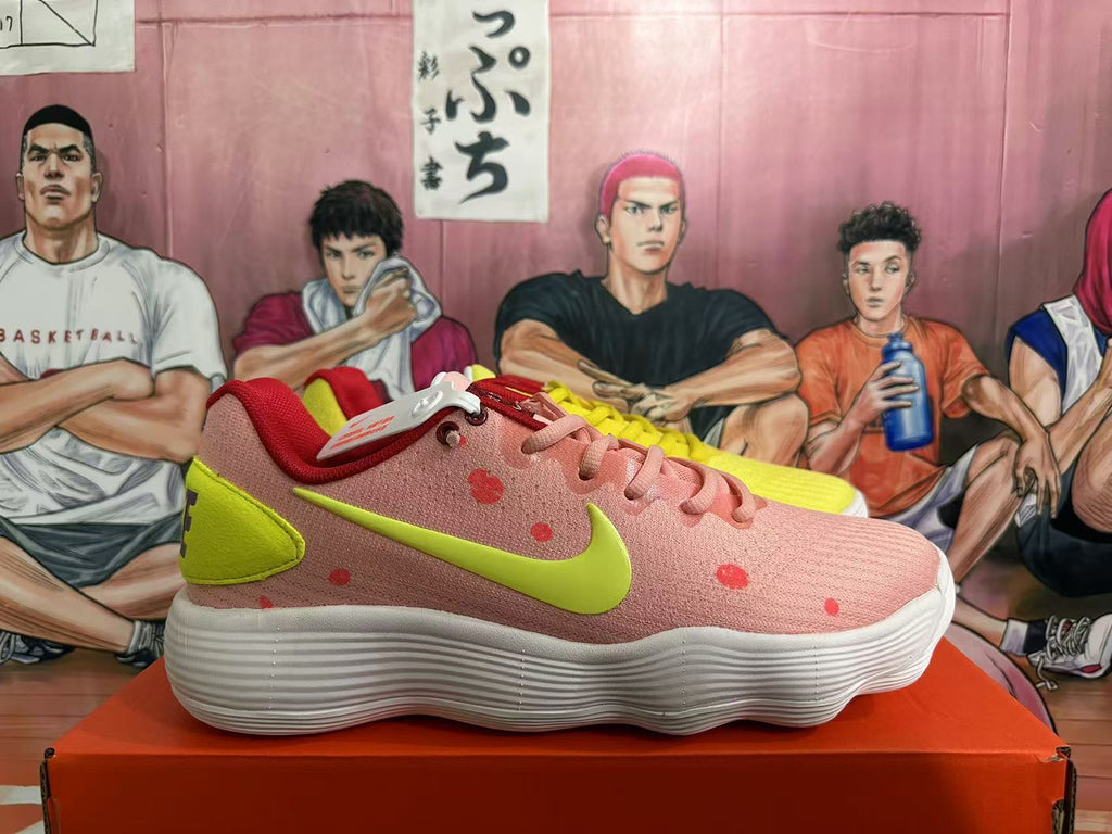 Pink and Volt Yellow Nike Basketball Shoes - product image from the listing.