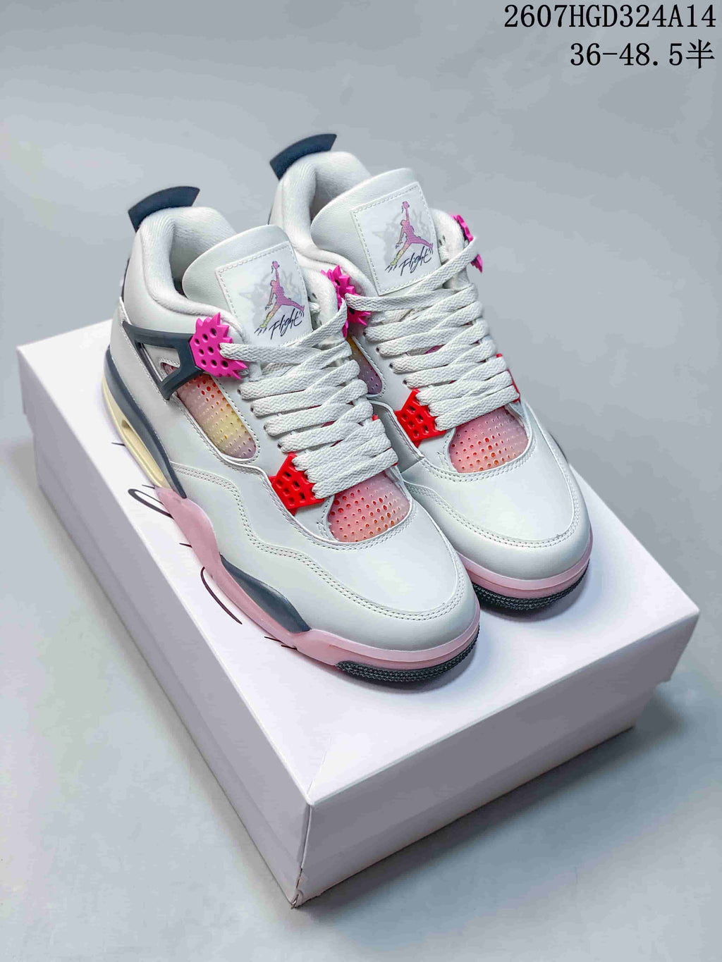 Air Jordan 4 Retro Comic White Black Pink Sneakers - product image from the listing.