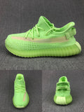 Adidas Yeezy Boost 350 V2 Kids Sneakers in Glow in Green - product image from the listing.