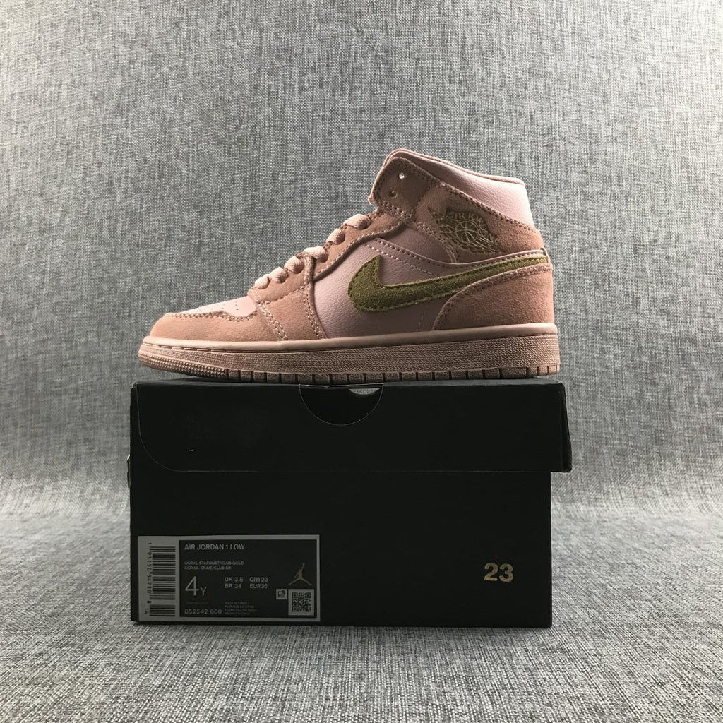 Jordan 1 Mid SE Sneakers in Pink 852542-600 - product image from the listing.