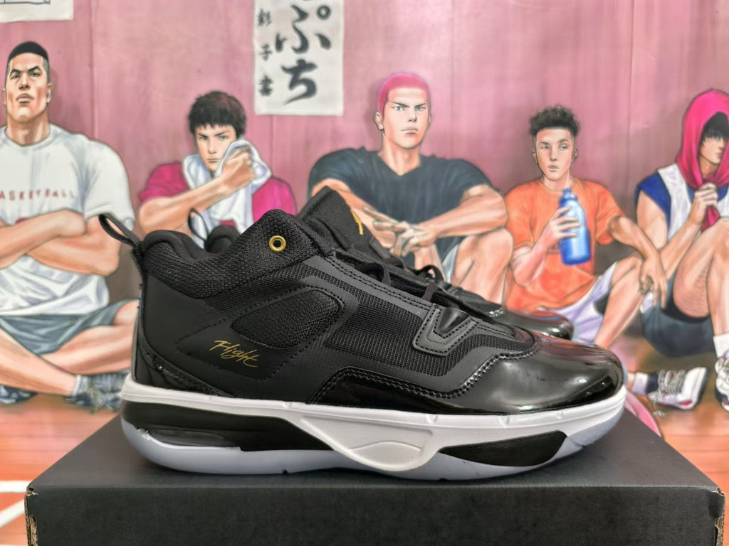 Jordan Black and Gold High-Cut Basketball Sneakers - product image from the listing.