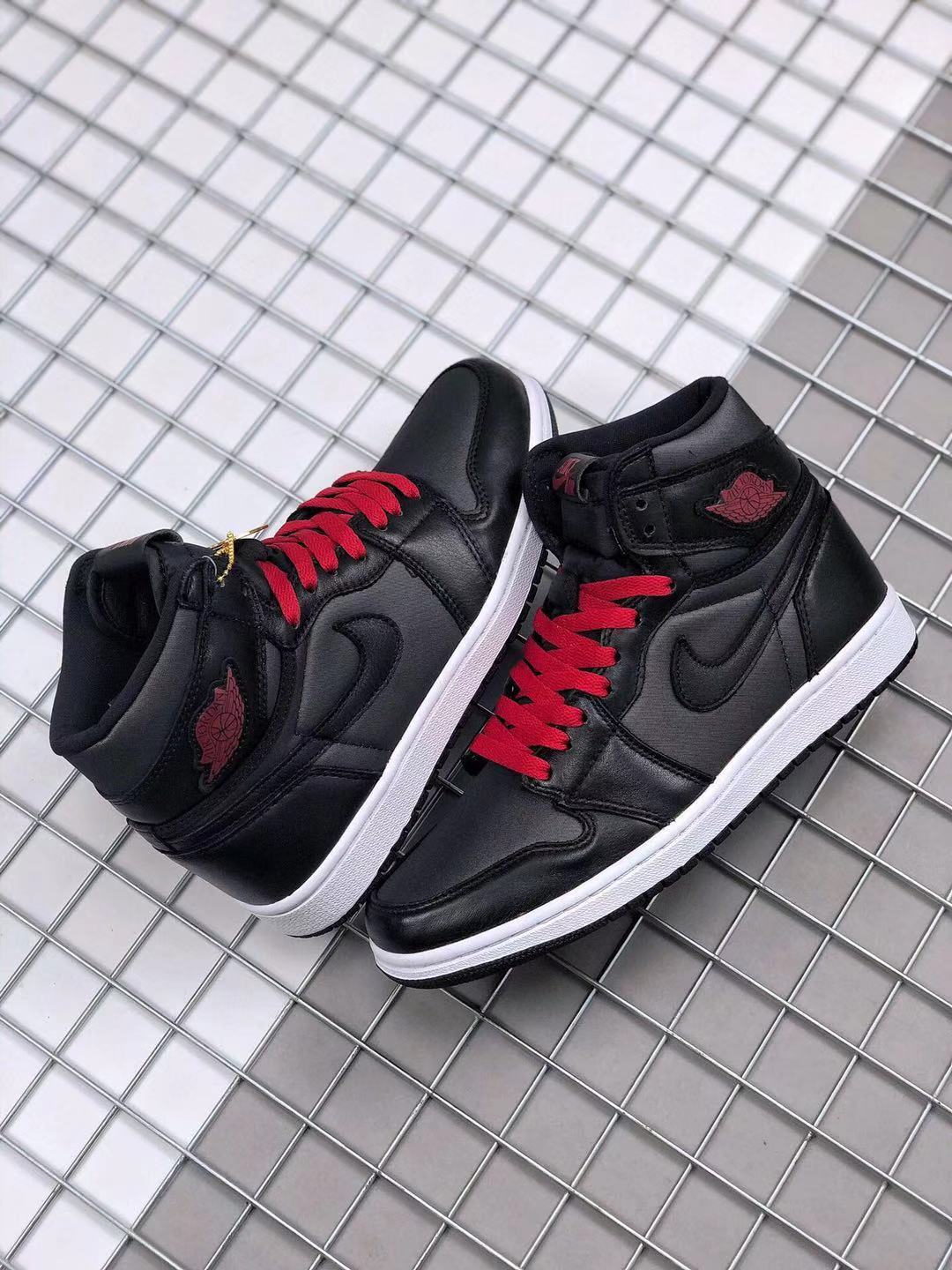 Air Jordan 1 High OG Black Satin Sneakers in Black Red - product image from the listing.