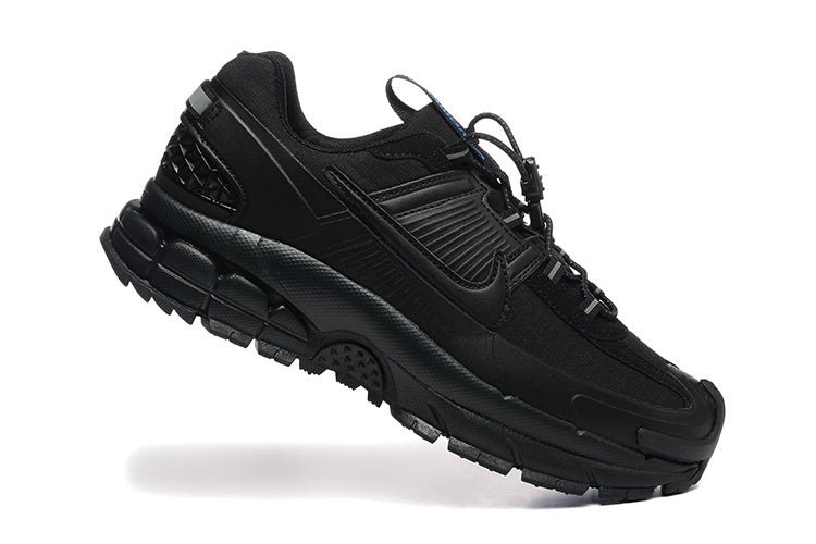 Nike Black Trail-Style Trainers - product image from the listing.