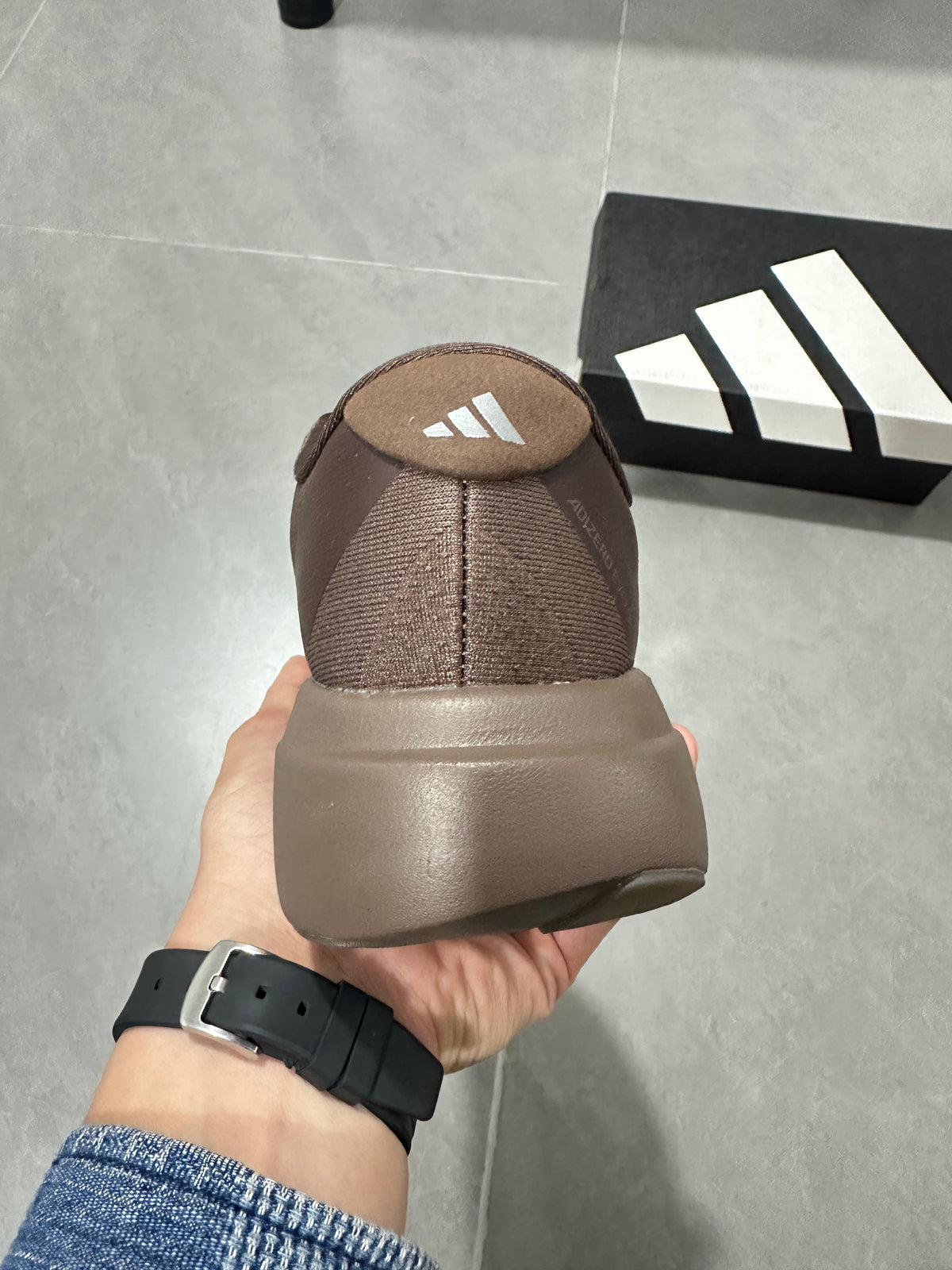 Brown and Tan Adidas Lightstrike Pro Running Shoes - product image from the listing.