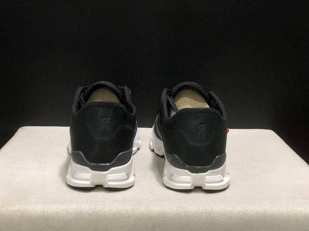 Black and White On Cloud X 4 AD Sneakers - product image from the listing.