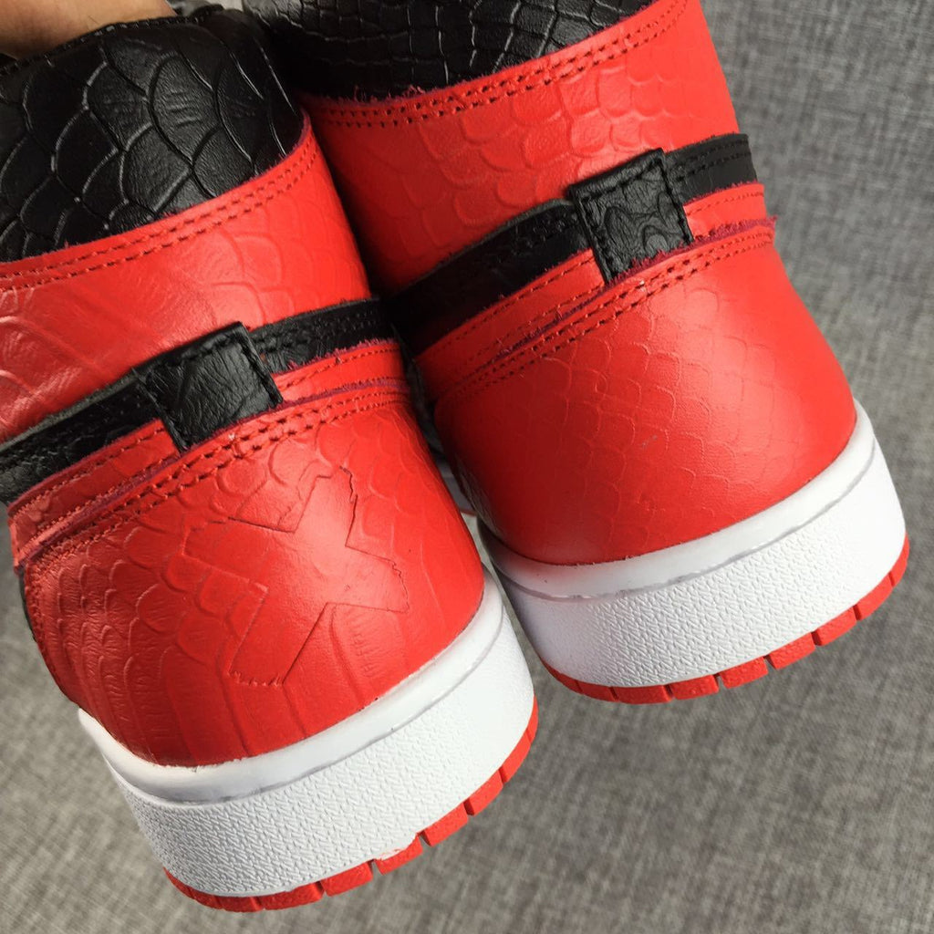Black Red Scale-Textured Sneakers - Air Jordan 1 High - product image from the listing.