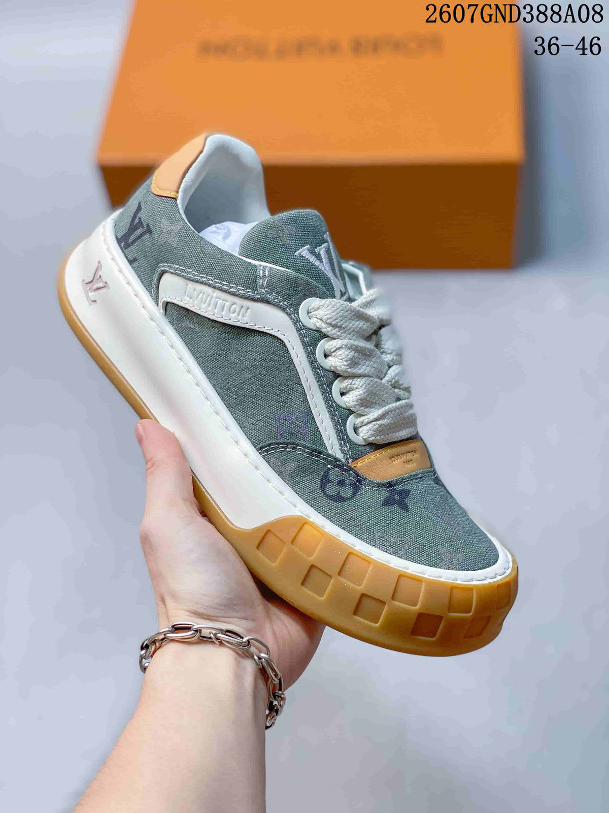 Louis Vuitton Tilted Low-Cut Sneakers in Green Monogram - product image from the listing.