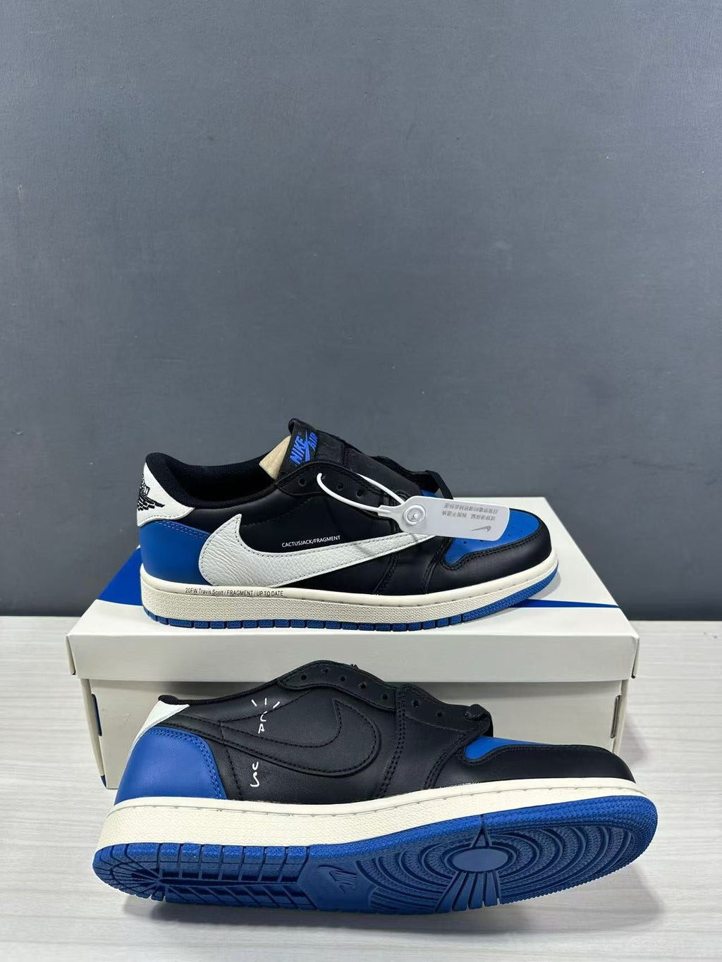 Air Jordan 1 Low Travis Scott Fragment Black Blue Sneakers - product image from the listing.