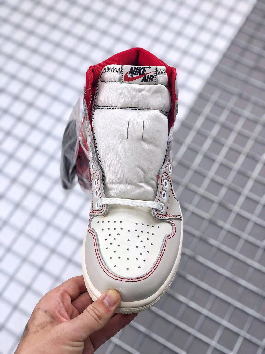 Air Jordan 1 Retro High OG Sneakers in White and Red - product image from the listing.