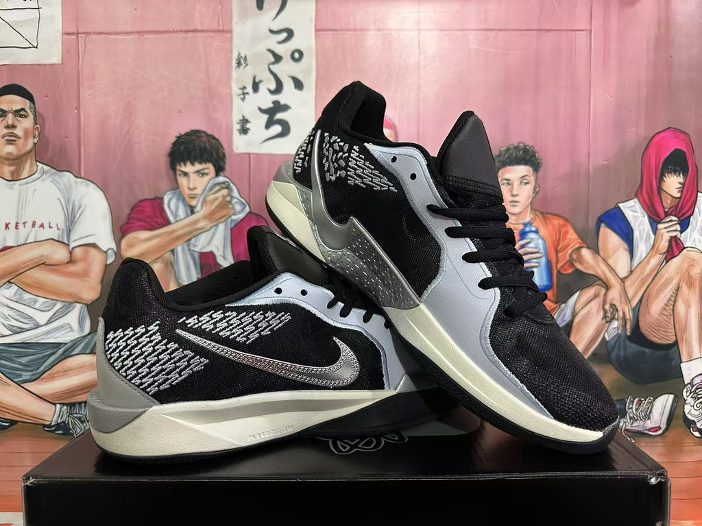 Nike Basketball Sneakers in Black and Silver - product image from the listing.
