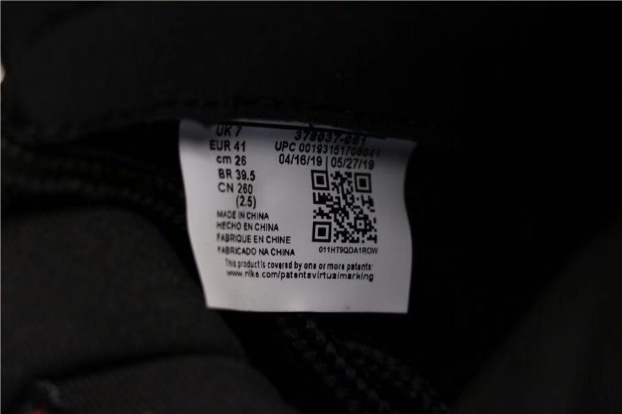Air Jordan 11 Retro Bred High-Top Sneakers in Black and Red - product image from the listing.
