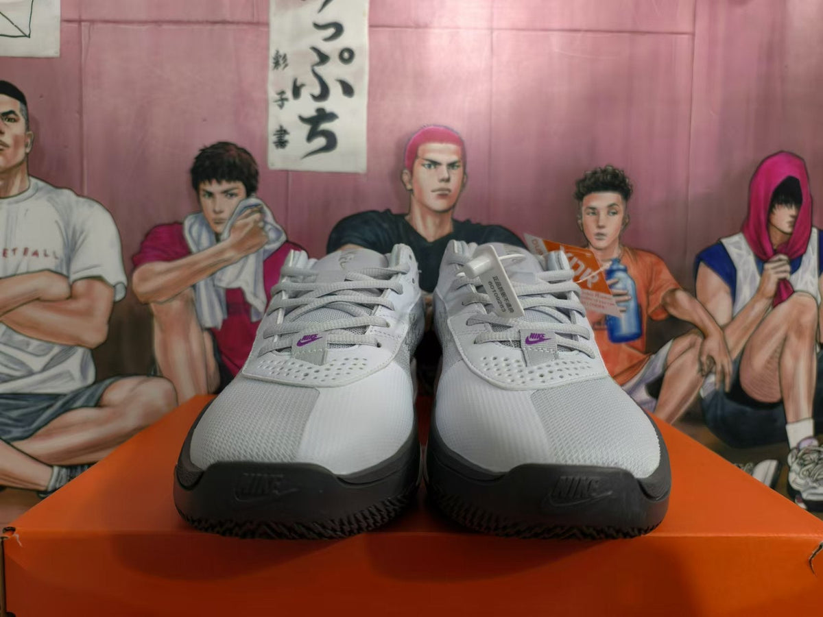 Gray and Purple Nike Giannis Immortality Basketball Shoes - product image from the listing.