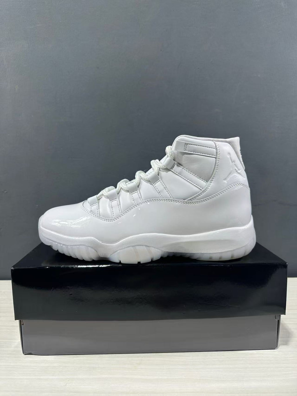 Air Jordan 11 Retro All-White High-Top Sneakers - product image from the listing.