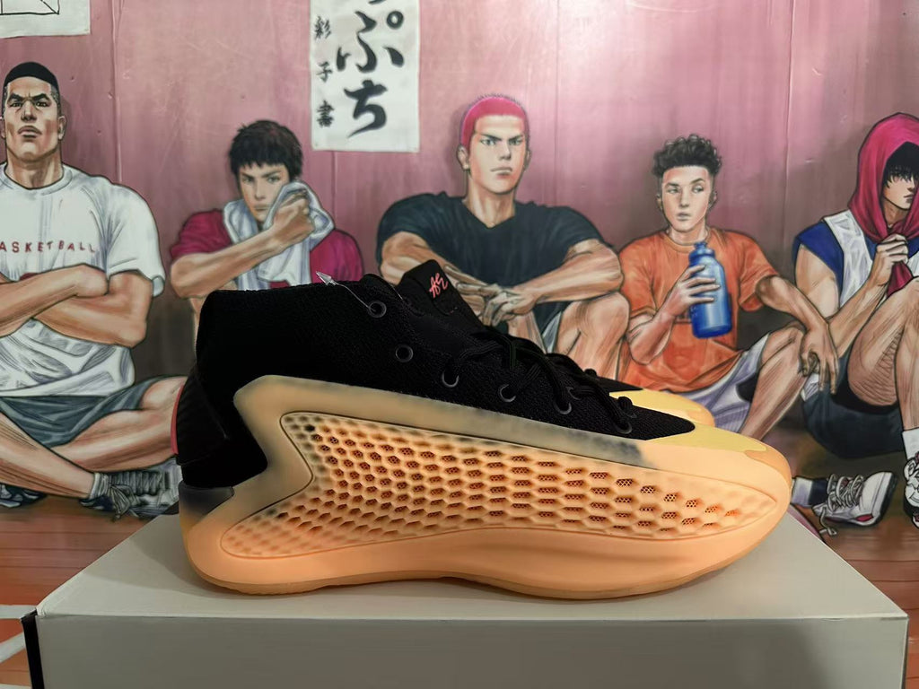 Black and Orange Adidas Basketball Shoes - product image from the listing.