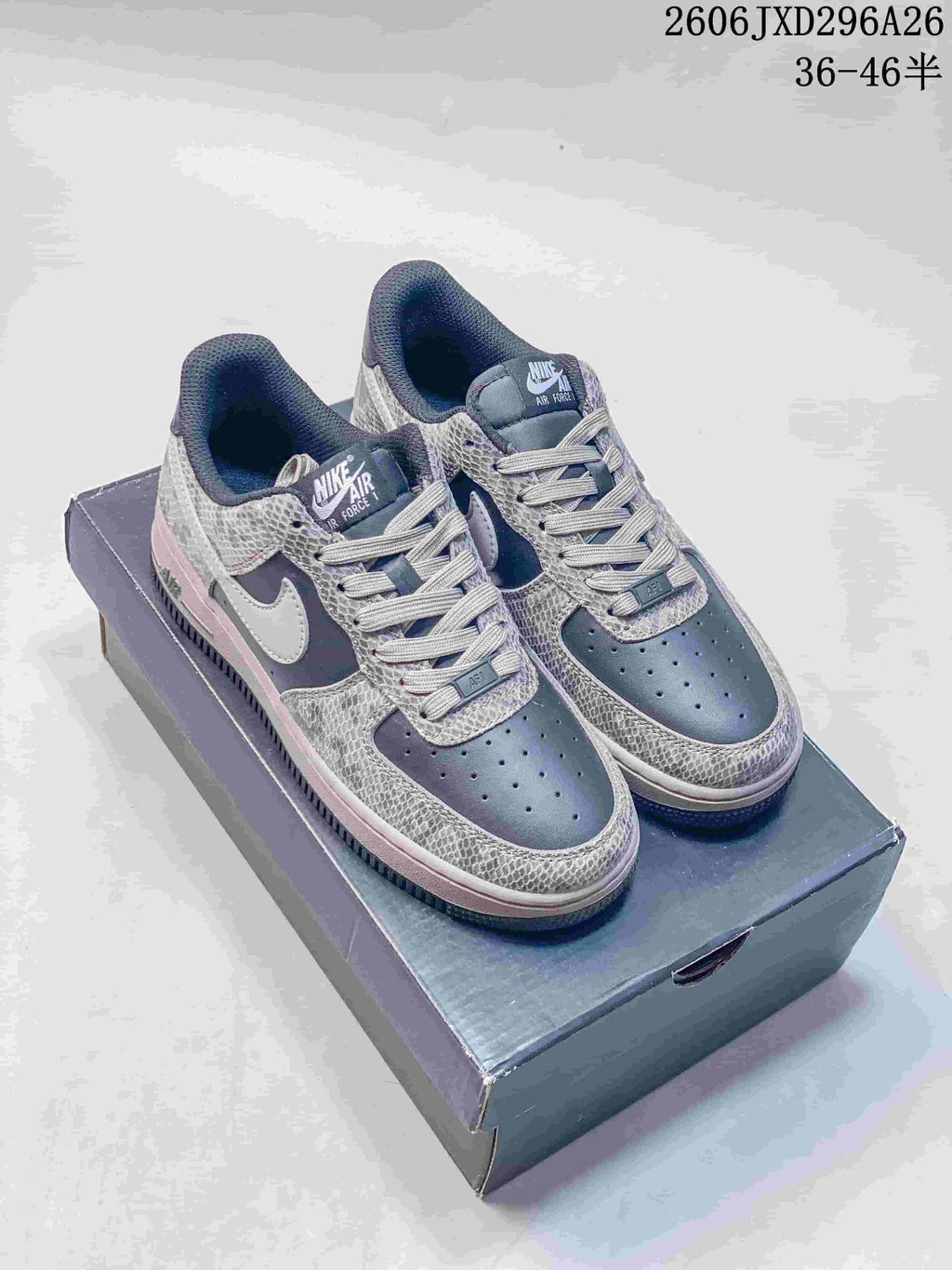 Nike Air Force 1 '07 Low-Top Sneakers in Grey White - product image from the listing.