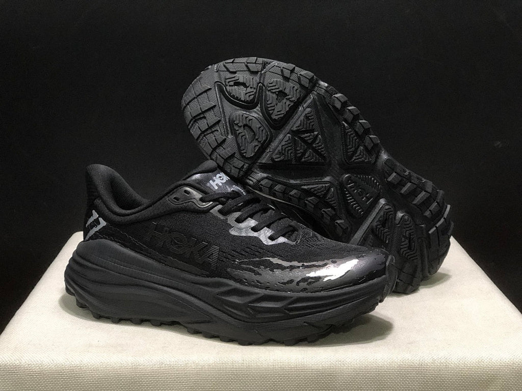 HOKA Stinson 7 Black Trail Trainers - product image from the listing.