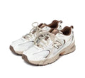 New Balance MR530NI Sneakers in White and Brown - product image from the listing.