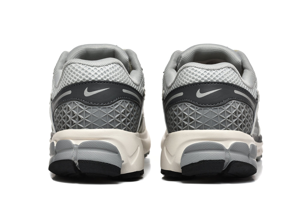 Grey and White Nike Zoom Vomero 5 Sneakers - product image from the listing.