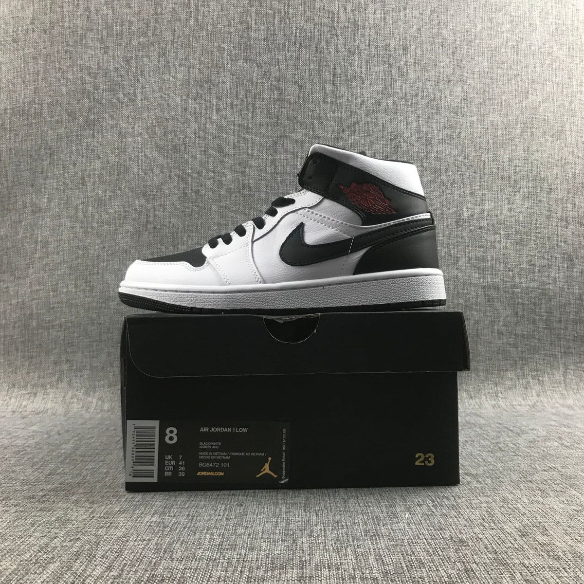 Jordan 1 Mid Reverse Black Toe Sneakers in Black and White BQ6472-101 - product image from the listing.