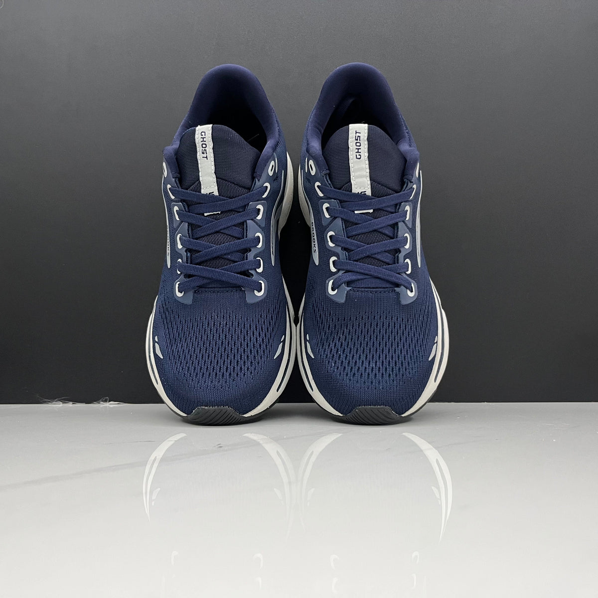 Navy and White Brooks Ghost 15 Running Shoes - product image from the listing.