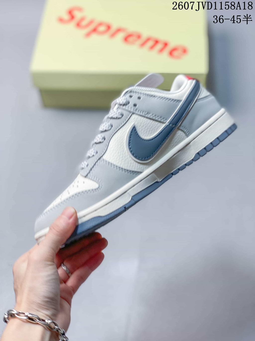 Nike SB Dunk Low Sneakers in Gray White Black - product image from the listing.