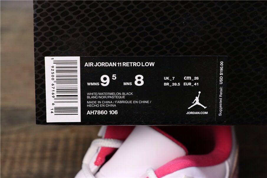 Women's Air Jordan 11 Retro Low Pink Snakeskin Sneakers - product image from the listing.