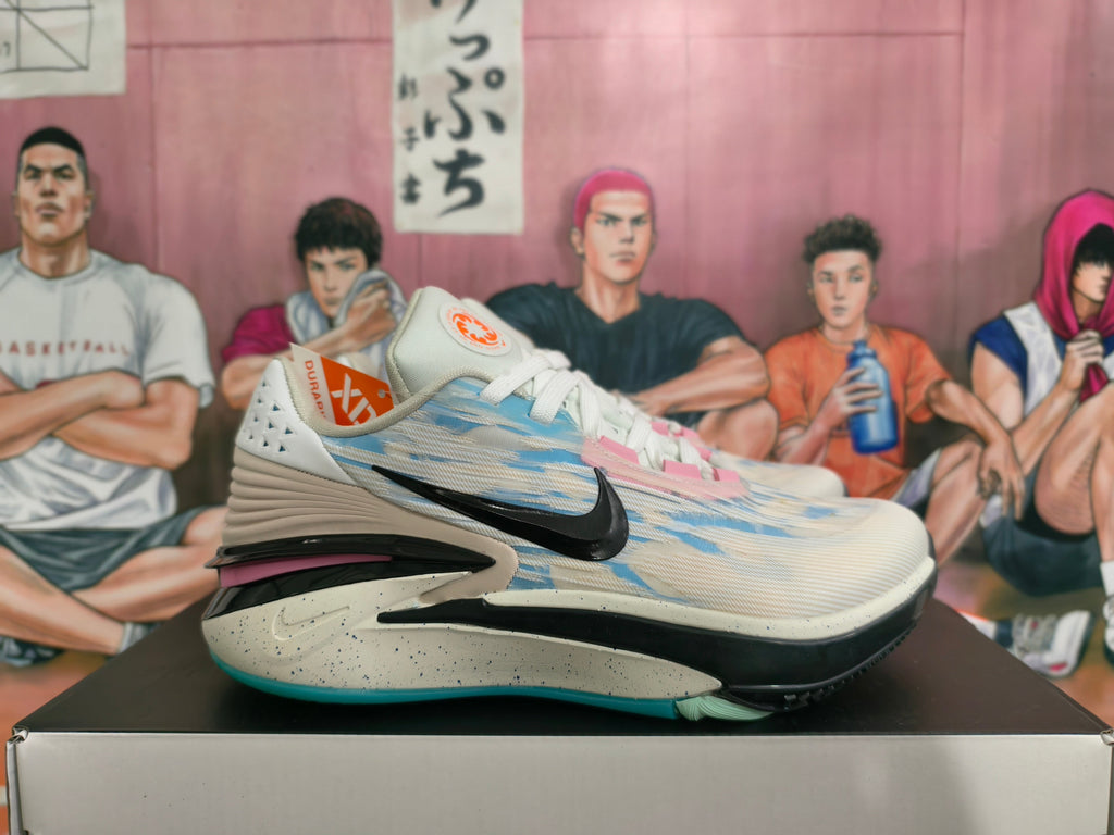 Nike Basketball Footwear in Gray Blue with Pink Accents - product image from the listing.