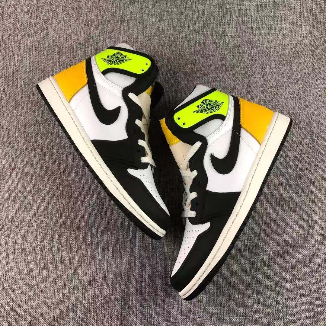 Air Jordan 1 High OG Volt Gold Sneakers Black White - product image from the listing.
