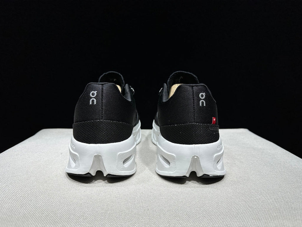 On CloudEclipse Running Shoes in Black and White - product image from the listing.