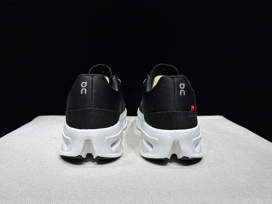 On CloudEclipse Running Shoes in Black and White - product image from the listing.