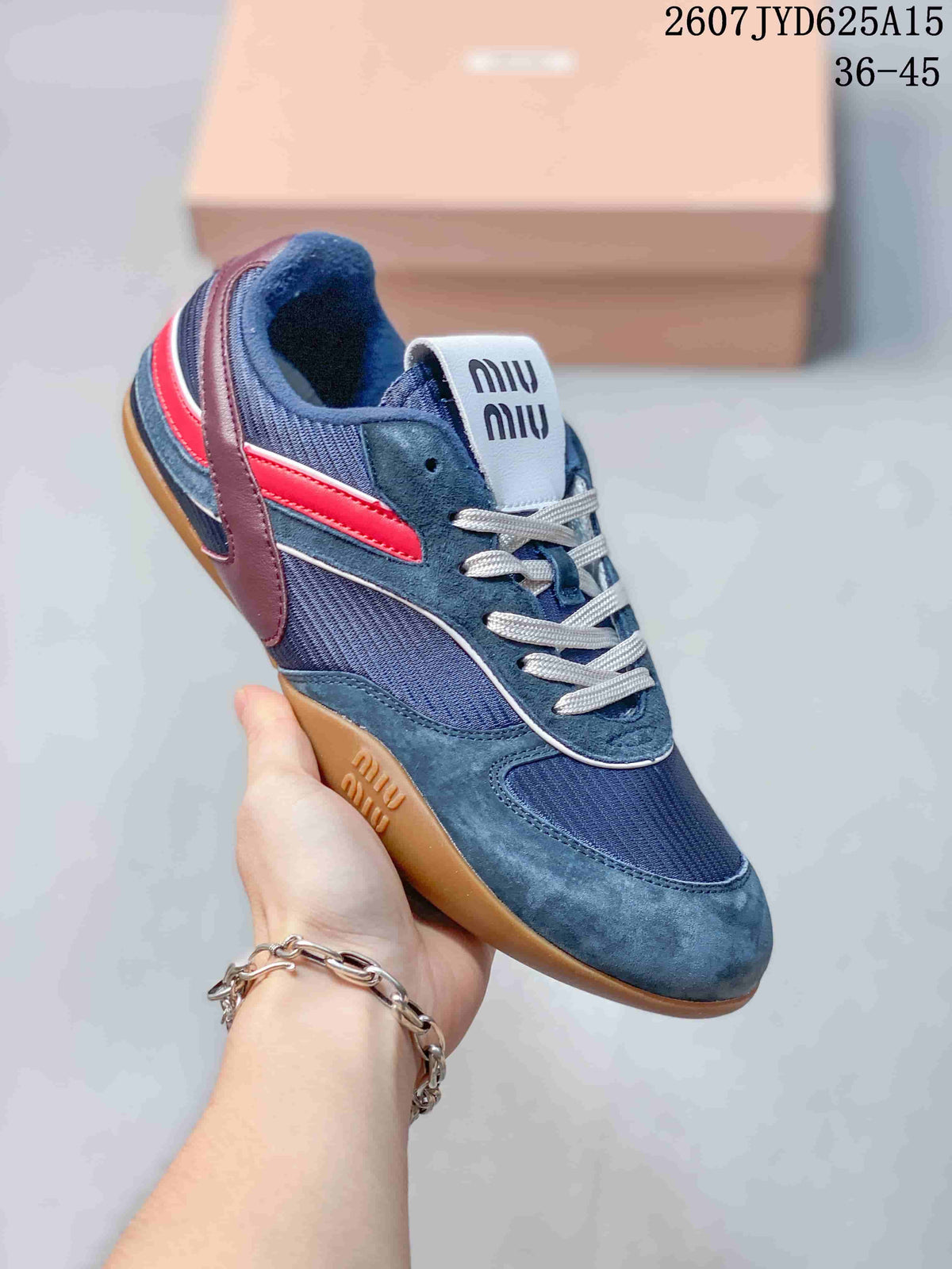 Miu Miu Gymnasium Low-Top Sneakers in Navy Red 2607JYD625A15 - product image from the listing.