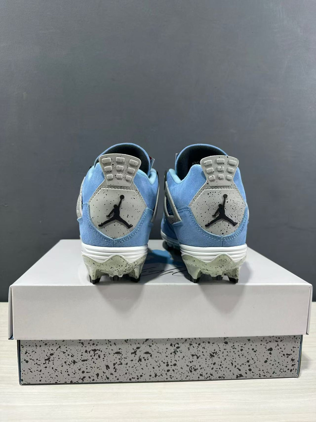Air Jordan 4 University Blue Cleats CT8572-400 - product image from the listing.