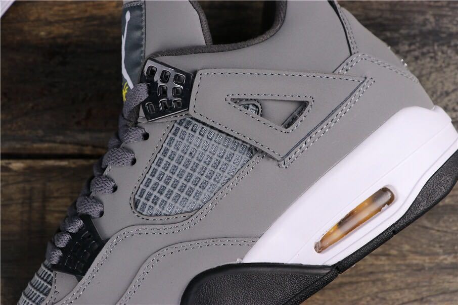 Air Jordan 4 Cool Grey Sneakers 308497-007 - product image from the listing.
