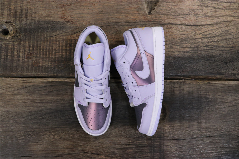 Air Jordan 1 Low GS Oxygen Sneakers in Purple 554723-505 - product image from the listing.