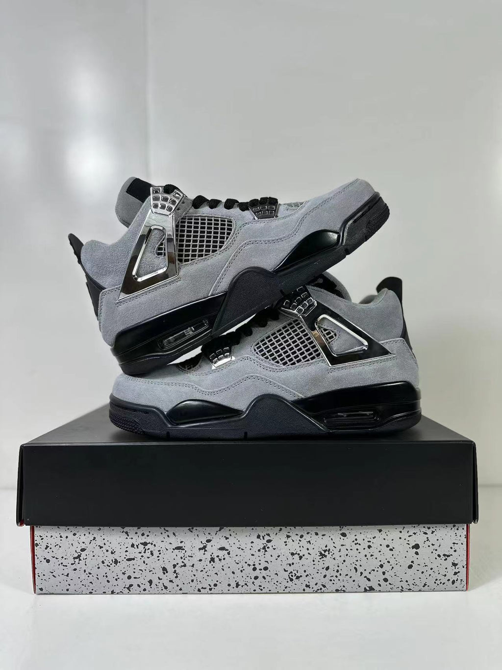 Air Jordan 4 Retro Gray Black Sneakers AQ9129-005 - product image from the listing.