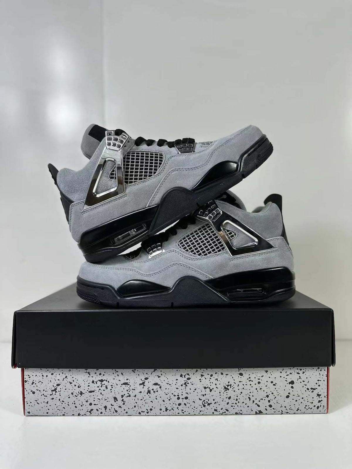 Air Jordan 4 Retro Gray Black Sneakers AQ9129-005 - product image from the listing.