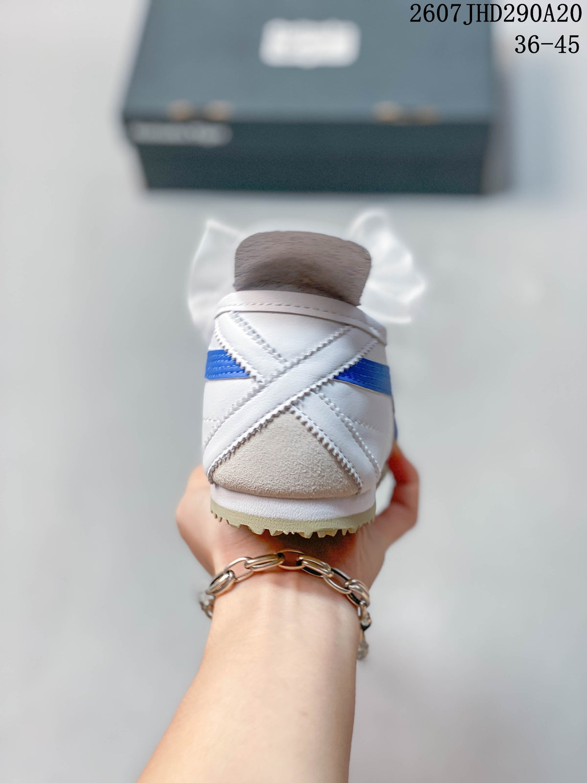 Onitsuka Tiger MEXICO 66 SD Sneakers in White Blue Red - product image from the listing.